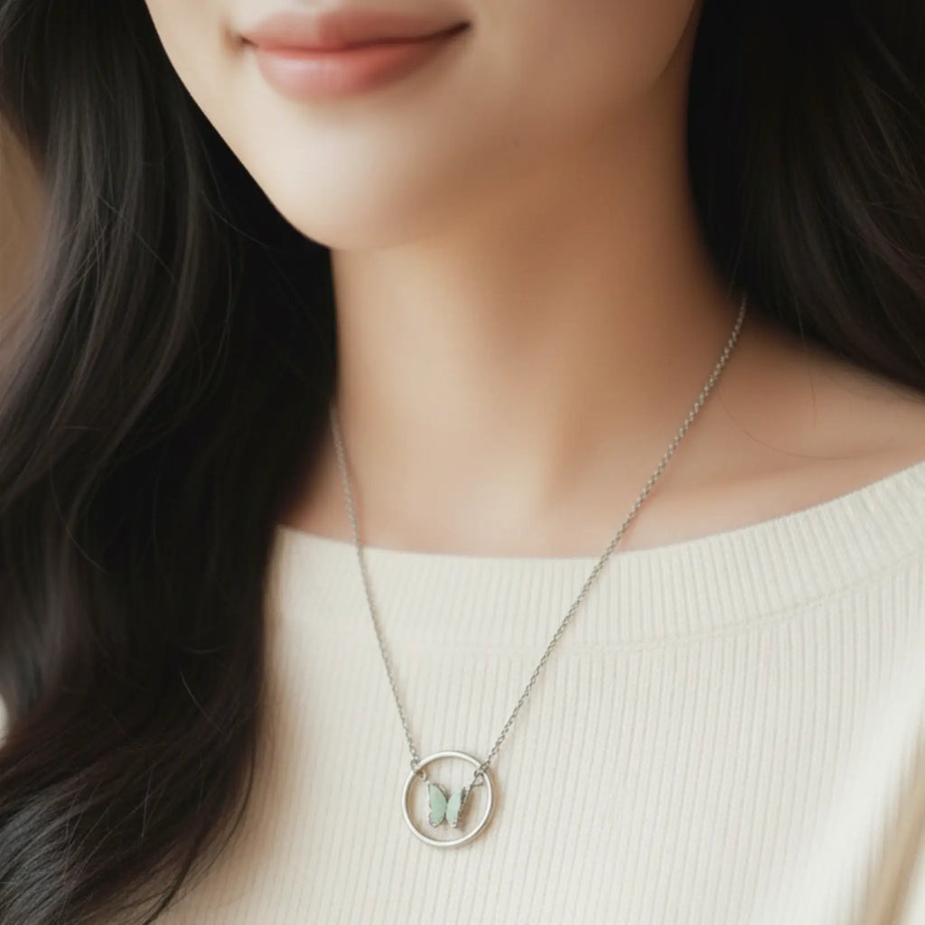 Close-up of Shinora Midnight Fly butterfly pendant – minimalist silver necklace for everyday elegance from Shinora