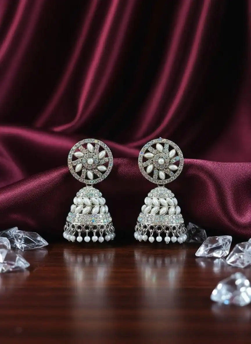 Chandani Pearl Jhumka silver oxidized jhumka earrings with pearls, handcrafted Indian jewellery displayed on velvet background jewellery
