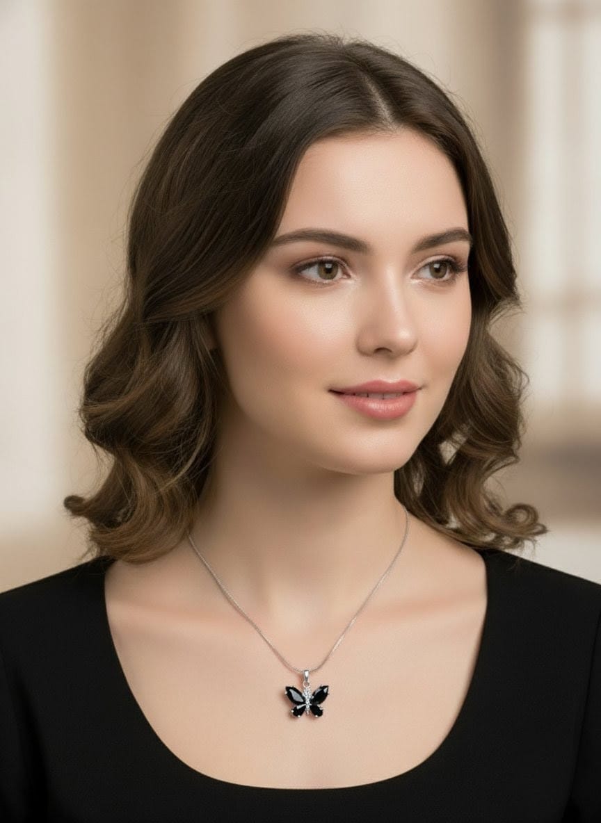 Model wearing The Fluttering Charm butterfly necklace with black gemstones and silver detailing, styled with a black outfit for a modern chic look  by shinora